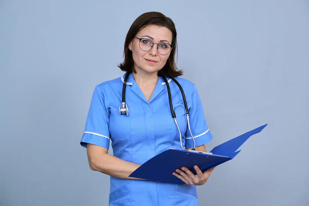 Image of a practice nurse holding a folder
